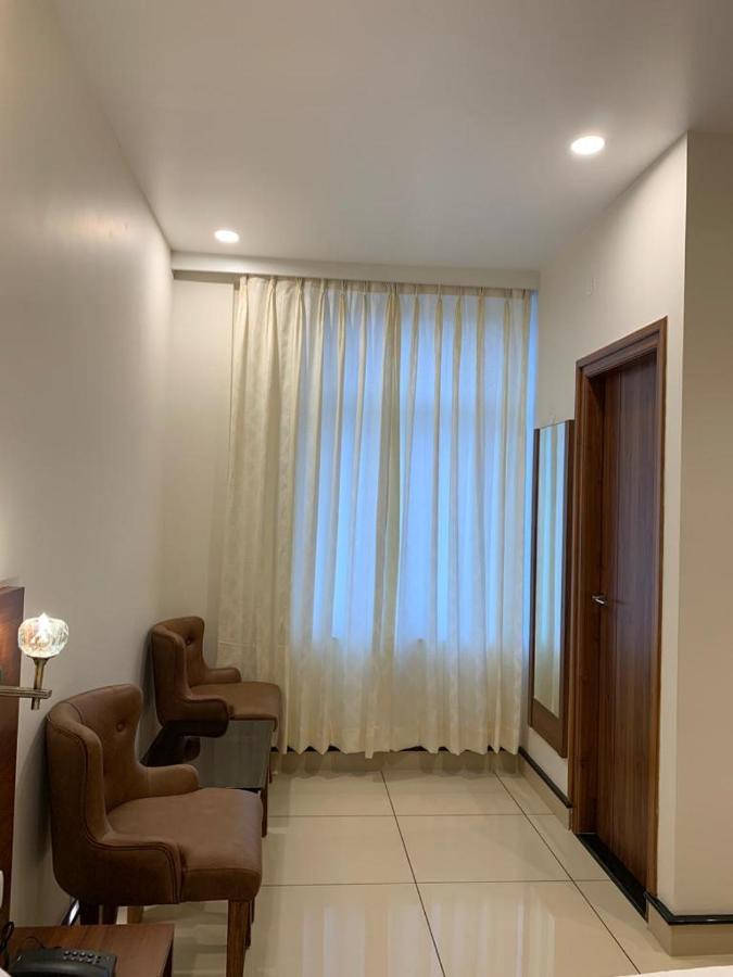 Jesta Residency Hotel Hassan Buitenkant foto